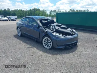 2022 Tesla Model 3 Long Range z VIN 5YJ3E1EB0NF124664, wystawiony jako IAAI lot #34246337 z przebiegiem Nie podano mil oraz . Historia ofert i sprzedaży dostępna na DreamBid. Obrazek 1.