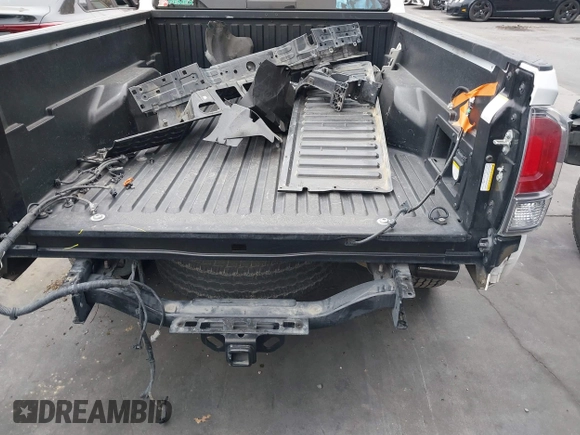 2021 Toyota Tacoma 4WD SR5 with VIN 3TMDZ5BN7MM103321, listed as a IAAI auction lot 41765512 with 49,009 mi miles. Bid and sale history available at carsss.com. Image 6.