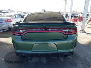 2022 Dodge Charger Scat Pack Widebody with VIN 2C3CDXGJ1NH216763, listed as a IAAI auction lot 41259159 with 32,610 mi miles and . Bid and sale history available at DreamBid. Image 16.
