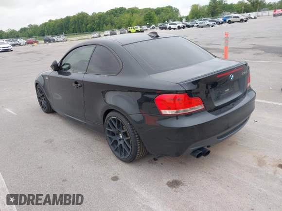 2012 BMW 1 Series 135i with VIN WBAUC9C5XCVM12693, listed as a IAAI auction lot 42341971 with 121,596 mi miles and . Bid and sale history available at DreamBid. Image 3.