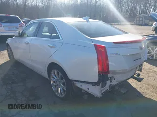 2016 Cadillac ATS Sedan Luxury Collection AWD with VIN 1G6AH5SX5G0106431, listed as a IAAI auction lot 41844622 with 124,759 mi miles. Bid and sale history available at carsss.com. Image 3.