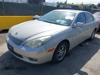 2004 Lexus ES 330 with VIN JTHBA30GX45038962, listed as a IAAI auction lot 41928613 with 301,057 mi miles. Bid and sale history available at carsss.com. Image 2.