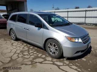 2012 Honda Odyssey EX-L with VIN 5FNRL5H62CB117931, listed as a Copart auction lot 48454915 with 155,600 mi miles and Salvage Title. Bid and sale history available at carsss.com. Image 4.