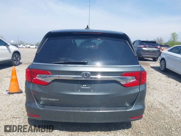 2018 Honda Odyssey EX-L z VIN 5FNRL6H77JB096733, wystawiony jako IAAI lot #42133737 z przebiegiem 165 069 mil mil oraz . Historia ofert i sprzedaży dostępna na DreamBid. Obrazek 16.