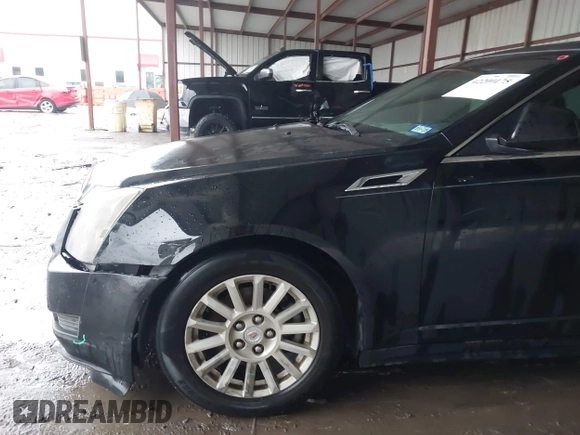2012 Cadillac CTS Luxury with VIN 1G6DE5E59C0103526, listed as a IAAI auction lot 42200175 with 181,023 mi miles and . Bid and sale history available at DreamBid. Image 6.