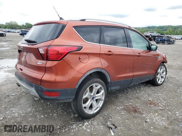 2019 Ford Escape Titanium with VIN 1FMCU9J96KUC45752, listed as a Copart auction lot 55819195 with 51,748 mi miles and Salvage title. Bid and sale history available at DreamBid. Image 3.