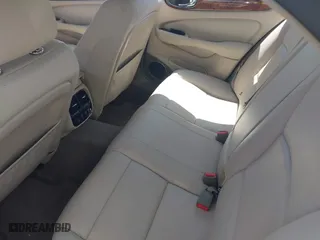 2004 Jaguar XJ with VIN SAJWA73BX4TG14270, listed as a IAAI auction lot 41905325 with 104,908 mi miles. Bid and sale history available at carsss.com. Image 13.