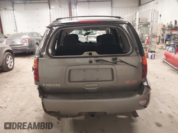 2005 GMC Envoy SLT with VIN 1GKDT13S352257892, listed as a IAAI auction lot 41690880 with 134,216 mi miles. Bid and sale history available at carsss.com. Image 16.