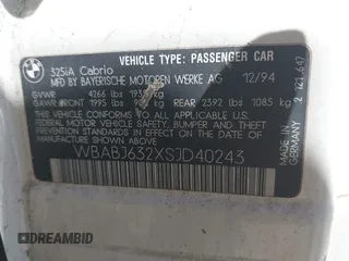 1995 BMW 3 Series 325iC with VIN WBABJ632XSJD40243, listed as a IAAI auction lot 41838410 with 199,909 mi miles. Bid and sale history available at carsss.com. Image 9.