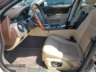 2014 Jaguar XJ with VIN SAJWA1CZ3E8V69877, listed as a Copart auction lot 51520405 with 57,567 mi miles and Clean Title. Bid and sale history available at DreamBid. Image 7.