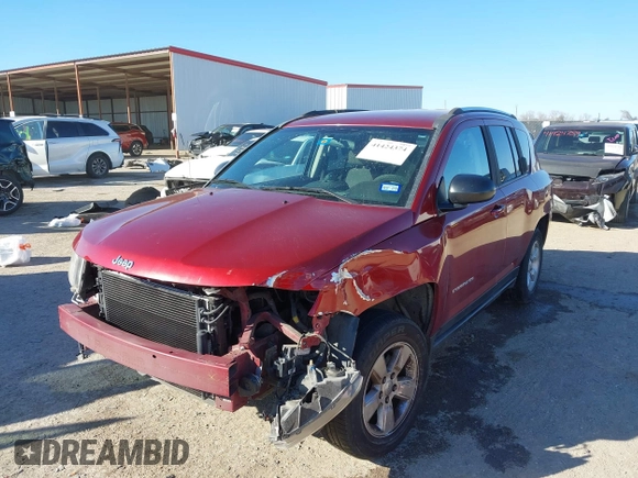 2014 Jeep Compass Sport with VIN 1C4NJCBA3ED812435, listed as a IAAI auction lot 41424374 with 174,663 mi miles and . Bid and sale history available at DreamBid. Image 18.