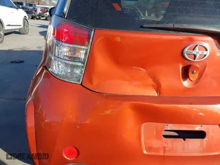 2012 Scion iQ with VIN JTNJJXB0XCJ018782, listed as a IAAI auction lot 41776080 with 73,359 mi miles. Bid and sale history available at carsss.com. Image 6.