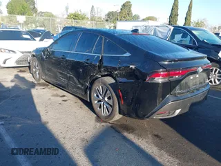 2022 Toyota Mirai XLE with VIN JTDAAAAA9NA007013, listed as a IAAI auction lot 41744965 with 23,243 mi miles and . Bid and sale history available at DreamBid. Image 3.