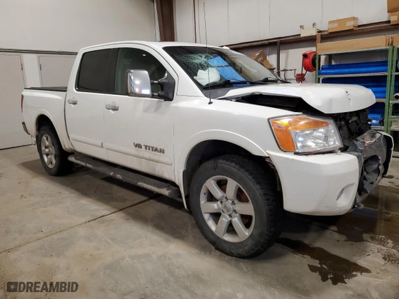 2010 Nissan Titan SE with VIN 1N6AA0EC3AN309550, listed as a Copart auction lot 83232974 with 339,025 mi miles and Salvage Title. Bid and sale history available at carsss.com. Image 4.