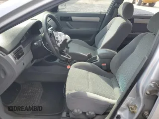 2006 Suzuki Forenza z VIN KL5JD56Z96K362651, wystawiony jako Copart lot #78306894 z przebiegiem 167 916 mil mil oraz Tytuł czysty. Historia ofert i sprzedaży dostępna na DreamBid. Obrazek 7.