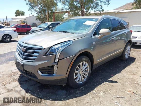 2018 Cadillac XT5 FWD with VIN 1GYKNARS5JZ242794, listed as a IAAI auction lot 42813475 with 32,266 mi miles and . Bid and sale history available at DreamBid. Image 17.