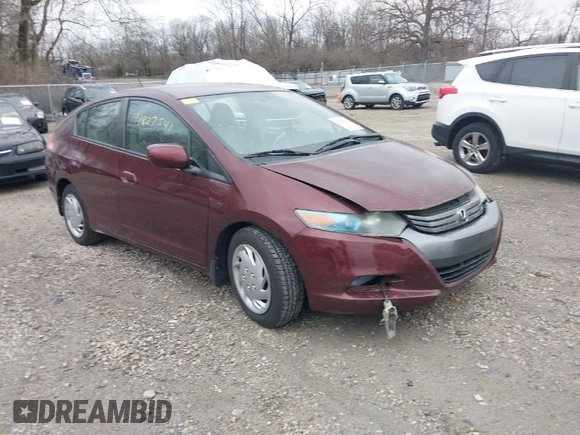 2011 Honda Insight LX z VIN JHMZE2H52BS004304, wystawiony jako IAAI lot #41827541 z przebiegiem 141 072 mil mil oraz . Historia ofert i sprzedaży dostępna na DreamBid. Obrazek 1.