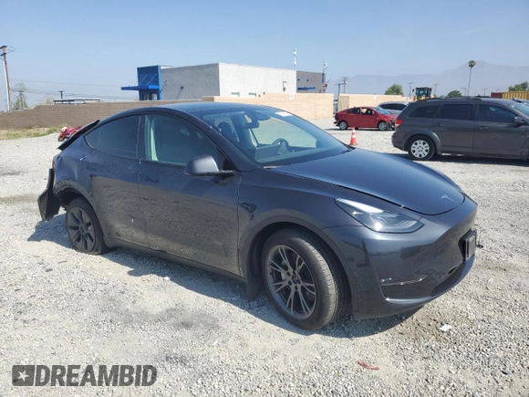 2024 Tesla Model Y Long Range z VIN 7SAYGDEE3RF121102, wystawiony jako Copart lot #60548895 z przebiegiem 13 336 mil mil oraz Szkoda całkowita • Salvage title. Historia ofert i sprzedaży dostępna na DreamBid. Obrazek 4.