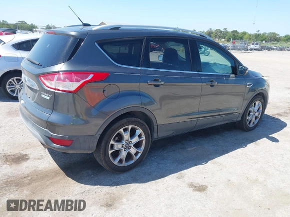 2016 Ford Escape Titanium with VIN 1FMCU0J95GUB11995, listed as a IAAI auction lot 42065255 with 142,390 mi miles. Bid and sale history available at carsss.com. Image 4.