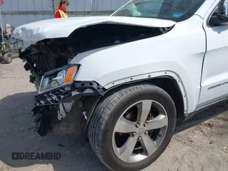2014 Jeep Grand Cherokee Limited z VIN 1C4RJFBG0EC288397, wystawiony jako IAAI lot #42157173 z przebiegiem 116 092 mil mil oraz . Historia ofert i sprzedaży dostępna na DreamBid. Obrazek 6.