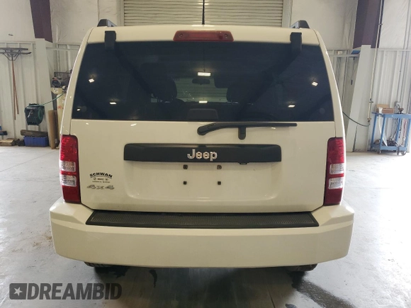 2010 Jeep Liberty Sport with VIN 1J4PN2GK2AW115064, listed as a Copart auction lot 57344645 with 114,275 mi miles and Salvage title. Bid and sale history available at DreamBid. Image 6.