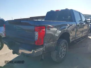2021 Ford Super Duty F-250 SRW XL with VIN 1FT7W2BN0MEC20314, listed as a IAAI auction lot 41164559 with 76,228 mi miles. Bid and sale history available at carsss.com. Image 4.