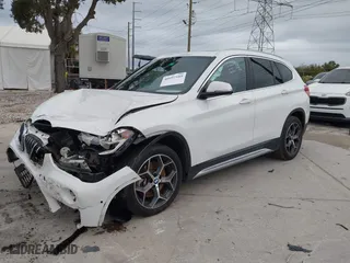 2018 BMW X1 xDrive28i with VIN WBXHT3C37J3H33461, listed as a IAAI auction lot 40997589 with 1 mi miles. Bid and sale history available at carsss.com. Image 18.