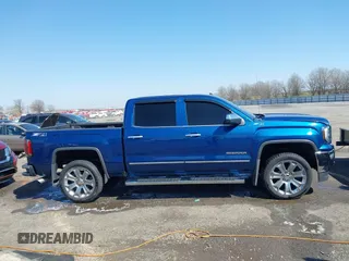 2018 GMC Sierra 1500 SLT z VIN 3GTU2NEC8JG254323, wystawiony jako IAAI lot #41772180 z przebiegiem 157 143 mil mil oraz . Historia ofert i sprzedaży dostępna na DreamBid. Obrazek 13.