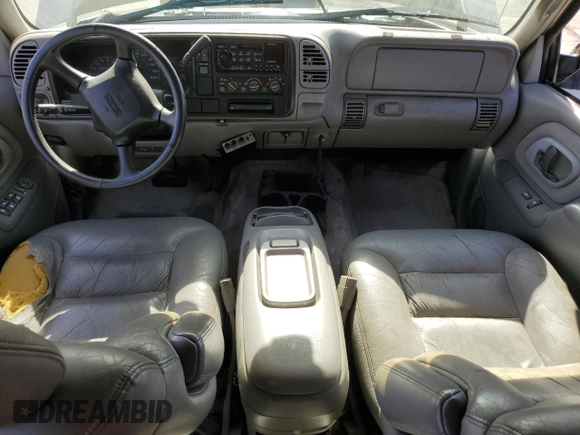 1999 GMC Yukon with VIN 1GKEC13R9XJ704929, listed as a Copart auction lot 89097295 with 87,478 mi miles and Salvage Title. Bid and sale history available at carsss.com. Image 8.