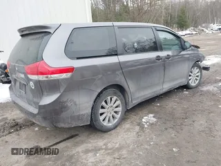 2014 Toyota Sienna L with VIN 5TDZK3DC9ES510214, listed as a IAAI auction lot 41721667 with 1 mi miles. Bid and sale history available at carsss.com. Image 4.