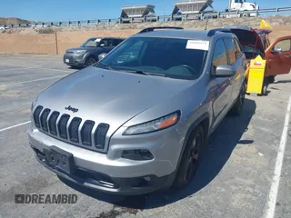 2016 Jeep Cherokee Latitude with VIN 1C4PJMCS4GW170322, listed as a IAAI auction lot 41841572 with 112,884 mi miles and . Bid and sale history available at carsss.com. Image 2.