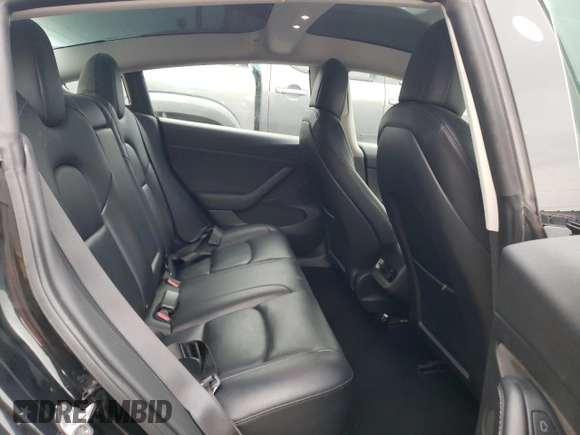 2022 Tesla Model 3 with VIN 5YJ3E1EA6NF188263, listed as a Copart auction lot 77542203 with 75,461 mi miles and Non Repairable. Bid and sale history available at DreamBid. Image 10.