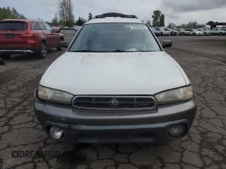 1996 Subaru Legacy Outback with VIN 4S3BG6850T7971454, listed as a Copart auction lot 52082395 with 173,542 mi miles and Salvage title. Bid and sale history available at DreamBid. Image 5.