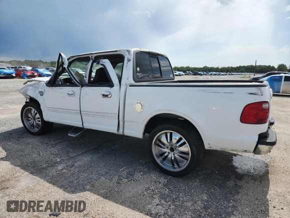 2001 Ford F-150 XLT with VIN 1FTRW07W71KE61878, listed as a Copart auction lot 60516665 with Not provided miles and Salvage title. Bid and sale history available at DreamBid. Image 2.