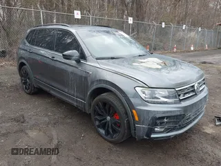 2021 Volkswagen Tiguan SE with VIN 3VV2B7AX5MM126415, listed as a IAAI auction lot 41811850 with Not Provided miles and . Bid and sale history available at DreamBid. Image 1.