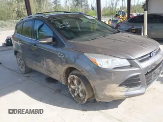2014 Ford Escape Titanium with VIN 1FMCU9JX0EUC45801, listed as a IAAI auction lot 42121561 with 80,217 mi miles and . Bid and sale history available at DreamBid. Image 1.