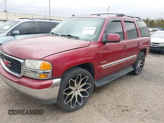 2004 GMC Yukon SLT with VIN 1GKEC13Z54R180532, listed as a IAAI auction lot 41695583 with 231,868 mi miles. Bid and sale history available at carsss.com. Image 2.