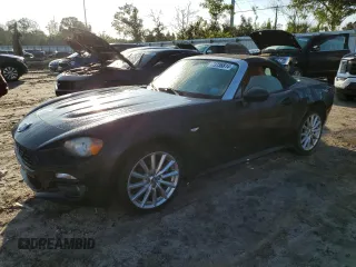 2017 FIAT 124 Spider Elaborazione Abarth z VIN JC1NFAEK4H0105671, wystawiony jako Copart lot #73736814 z przebiegiem Nie podano mil oraz Szkody całkowita. Historia ofert i sprzedaży dostępna na DreamBid. Obrazek 1.