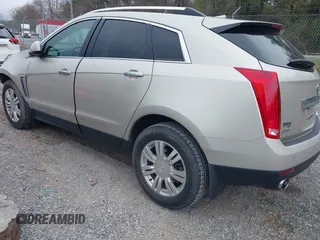 2013 Cadillac SRX Luxury Collection with VIN 3GYFNCE3XDS654531, listed as a IAAI auction lot 41931295 with 120,255 mi miles and . Bid and sale history available at carsss.com. Image 3.