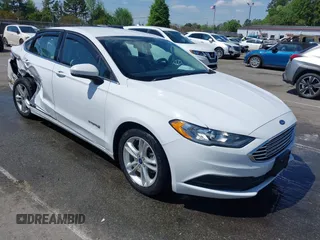 2018 Ford Fusion S z VIN 3FA6P0UU1JR204607, wystawiony jako IAAI lot #41985269 z przebiegiem 116 517 mil mil oraz . Historia ofert i sprzedaży dostępna na DreamBid. Obrazek 1.