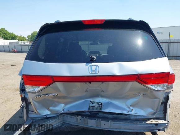 2014 Honda Odyssey Touring with VIN 5FNRL5H91EB068427, listed as a IAAI auction lot 42163315 with 184,134 mi miles and . Bid and sale history available at DreamBid. Image 17.