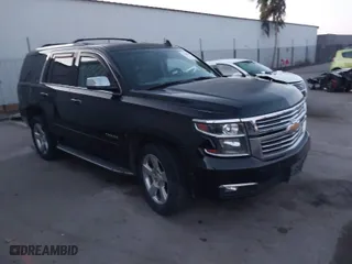 2015 Chevrolet Tahoe LTZ with VIN 1GNSKCKC4FR633432, listed as a IAAI auction lot 41338158 with 85,890 mi miles. Bid and sale history available at carsss.com. Image 1.