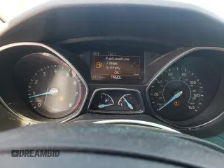 2016 Ford Focus SE z VIN 1FADP3F23GL355587, wystawiony jako Copart lot #53462345 z przebiegiem 101 628 mil mil oraz Szkoda całkowita • Salvage title. Historia ofert i sprzedaży dostępna na DreamBid. Obrazek 9.