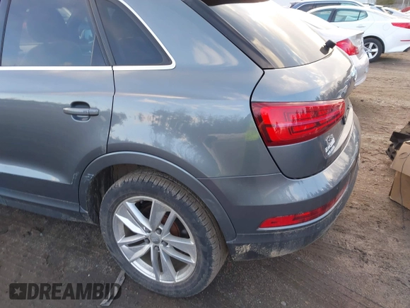 2016 Audi Q3 Premium Plus with VIN WA1EFCFS8GR007809, listed as a IAAI auction lot 41752028 with 102,774 mi miles. Bid and sale history available at carsss.com. Image 3.