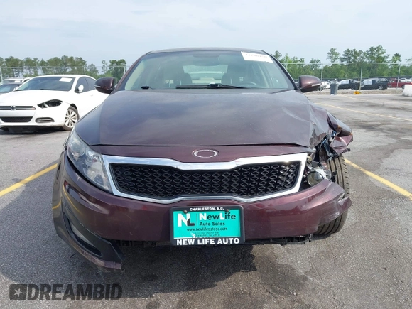 2012 Kia Optima LX z VIN 5XXGM4A70CG012349, wystawiony jako IAAI lot #42290950 z przebiegiem 112 293 mil mil oraz . Historia ofert i sprzedaży dostępna na DreamBid. Obrazek 6.