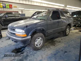 2000 Chevrolet Blazer LS z VIN 1GNCT18WXYK132399, wystawiony jako Copart lot #87880555 z przebiegiem 89 350 mil mil oraz Czysty tytuł • Clean title. Historia ofert i sprzedaży dostępna na DreamBid. Obrazek 1.