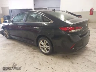 2019 Hyundai Sonata Sport with VIN 5NPE34AF4KH789783, listed as a IAAI auction lot 41082804 with 92,877 mi miles. Bid and sale history available at carsss.com. Image 3.