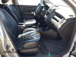 2005 Kia Sportage LX with VIN KNDJE723957128130, listed as a IAAI auction lot 41646193 with 188,142 mi miles and . Bid and sale history available at carsss.com. Image 5.