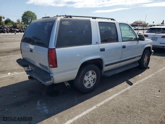 1995 Chevrolet Tahoe with VIN 1GNEK13K6SJ415105, listed as a Copart auction lot 65960124 with 219,821 mi miles and Salvage Title. Bid and sale history available at carsss.com. Image 3.