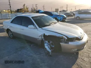1997 Lexus ES 300 Luxury Sport Sdn with VIN JT8BF22GXV0017164, listed as a Copart auction lot 86785844 with 69,756 mi miles and Salvage Title. Bid and sale history available at carsss.com. Image 4.
